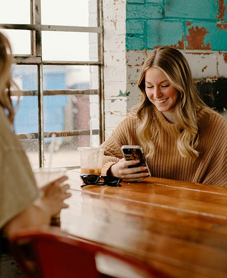 woman looking at her phone
