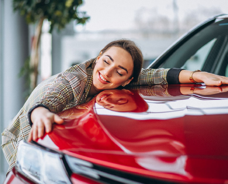 Girl laying on her new car