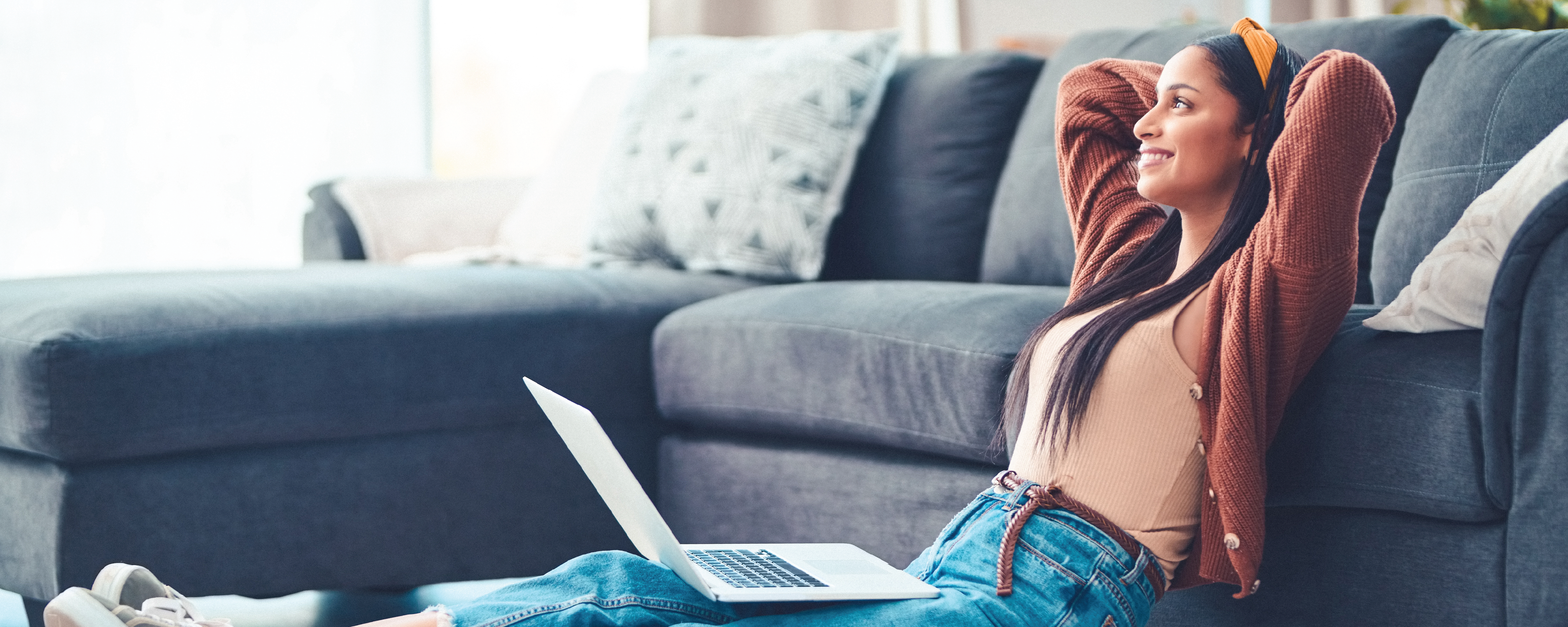 Woman relaxing with her laptop